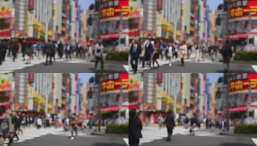 日本新宿歌舞伎町行人拥挤的抽象模糊背景高清在线视频素材下载