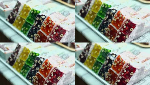 土耳其传统糖果，rahat lukum在集市的柜台。高清在线视频素材下载