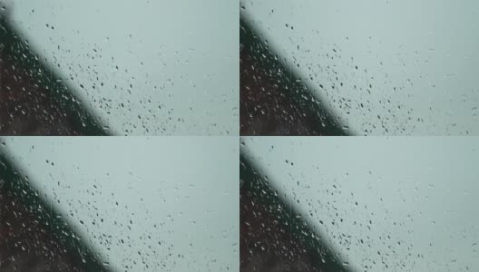 雨滴落在窗玻璃上。高清在线视频素材下载