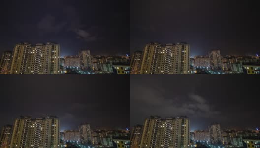 在一场雷雨中，闪电划过城市的夜空。光从建筑高清在线视频素材下载