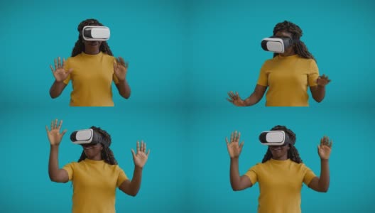 快乐年轻女性玩模拟游戏，使用VR头盔，增强现实高清在线视频素材下载