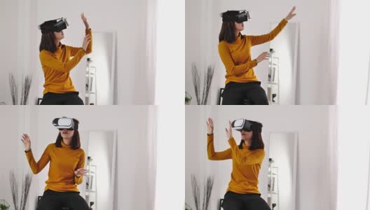 女人在家里的客厅里使用VR眼镜，特写高清在线视频素材下载