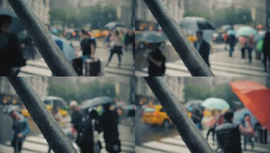慢镜头下的行人撑着雨伞在曼哈顿下雨的街道上高清在线视频素材下载
