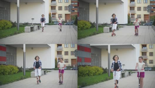 女孩和男孩在户外骑滑板车。快乐可爱的孩子们在街上玩，学习平衡踢板在农村高清在线视频素材下载