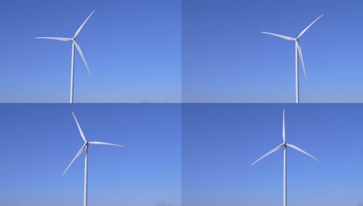 清洁能源，现代风车旋转和产生可持续的动力在天空的背景慢镜头高清在线视频素材下载