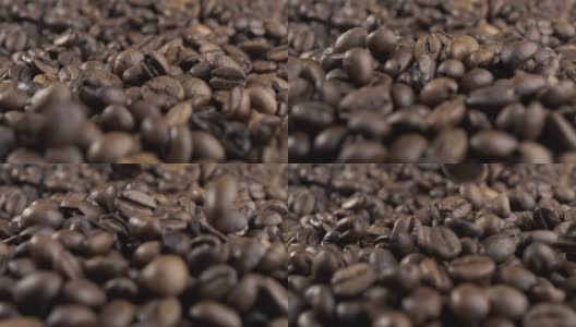 烘咖啡豆飘落。缓慢的运动。特写镜头高清在线视频素材下载