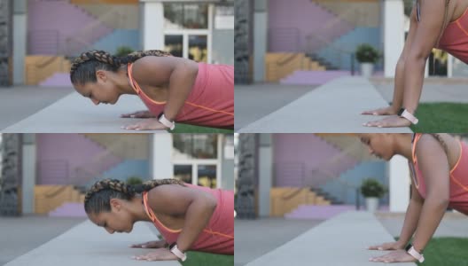 坚强的女人做俯卧撑锻炼高清在线视频素材下载