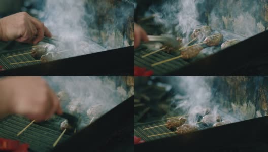 厨师在烧烤架上烤羊肉串高清在线视频素材下载