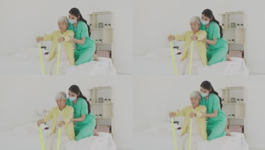 亚洲老年妇女关节炎在她的手臂接受关节炎物理治疗强韧带康复由专业护士或家庭健康助理在卧室在家里。高清在线视频素材下载