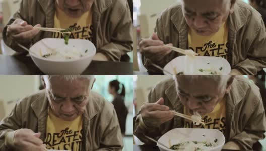 爷爷正在吃面条高清在线视频素材下载