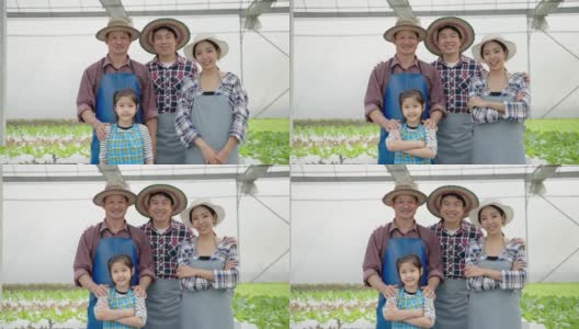 一个亚洲有机蔬菜农民家庭的肖像站在那里，微笑着对产品和服务的质量充满信心。高清在线视频素材下载