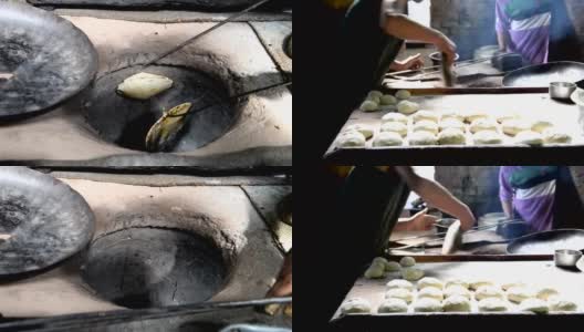 在印度用热砂锅煮薄饼高清在线视频素材下载