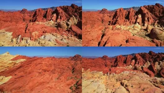 鸟瞰图上的红色和白色的峡谷和山脉在沙漠景观高清在线视频素材下载