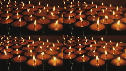 藏传佛教寺庙里燃烧的蜡烛高清在线视频素材下载