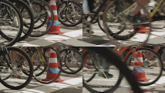 自行车轮接近等待绿灯。骑自行车上班的人高清在线视频素材下载