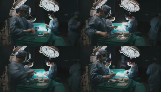 忙碌的外科医生在手术台上的延时视频高清在线视频素材下载