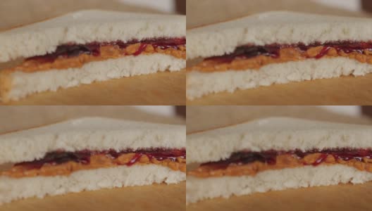 花生酱和果冻，果酱三明治旋转，旋转，特写，微距高清在线视频素材下载