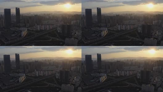 云南省昆明市日落时分的城市交通高清在线视频素材下载