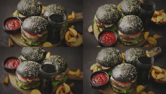 美味的黑色汉堡配肉饼和奶酪高清在线视频素材下载