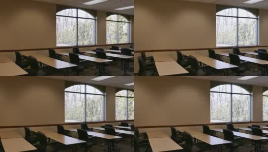 空荡荡的教室里有明亮的窗户和桌椅高清在线视频素材下载
