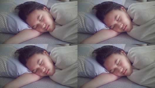 睡在床上的亚洲少女高清在线视频素材下载