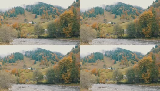 湍急、寒冷的Cheremosh山溪在喀尔巴阡山脉岩石海岸的背景上。Dzembronya山村初秋雾蒙蒙的早晨高清在线视频素材下载