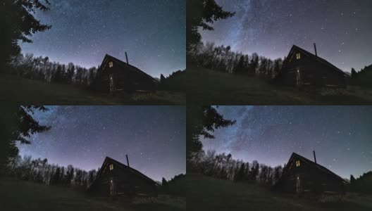 浪漫的星空与银河系快速旋转古老的木屋在野生森林的自然天文学时间推移4k高清在线视频素材下载