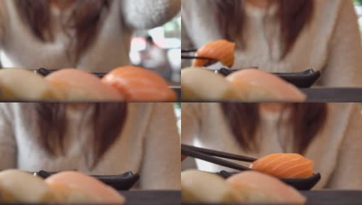 在餐馆吃日本寿司的女人高清在线视频素材下载