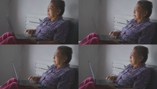 有笔记本电脑的活跃的老年女性高清在线视频素材下载