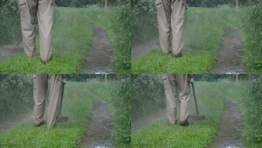 水的特写雨滴从修剪过的湿草上升高清在线视频素材下载