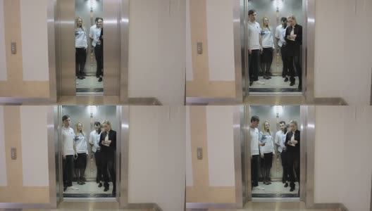 五名工人在电梯里高清在线视频素材下载