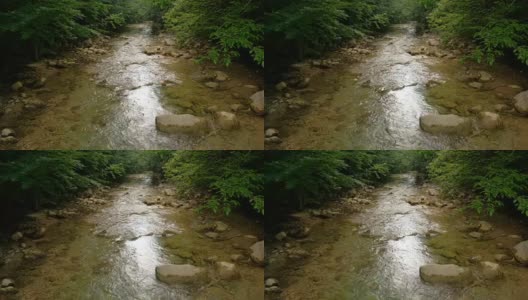 山河中奔流冒泡的水春天的细沟流。自然成分。高清在线视频素材下载