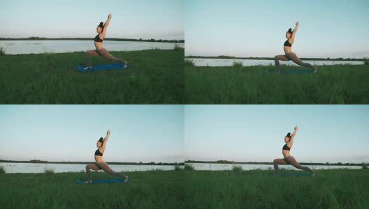年轻女孩穿着运动服做瑜伽早上在湖与copyspace高清在线视频素材下载