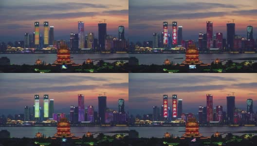 古老的建筑和现代的摩天大楼在城市的夜景在日落高清在线视频素材下载