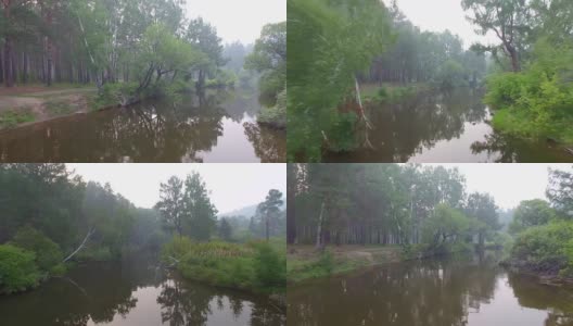 空中视频。夏季森林里有一条小山河高清在线视频素材下载