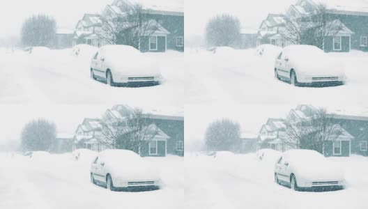 暴风雪中的房屋和汽车高清在线视频素材下载