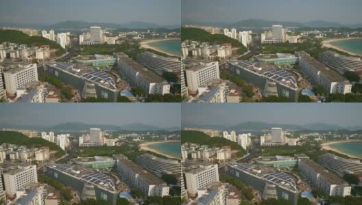 阳光明媚的一天三亚市著名的海滩湾屋顶全景4k海南中国高清在线视频素材下载