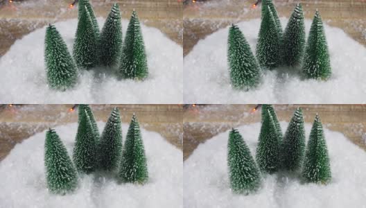 圣诞节的背景。辐射圣诞的心情。绿树在雪中。在4 k拍摄高清在线视频素材下载