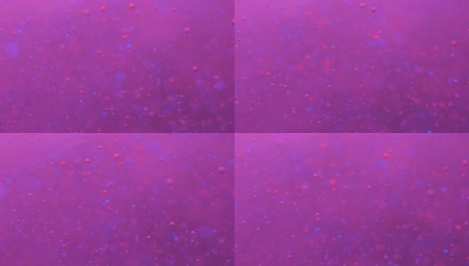 彩色的泡沫油美丽的油漆紫色的宇宙移动。空间星系的行星。星云空间恒星行星。银河系。粉色表面的宇宙在移动。蓝色假日背景圣诞节。高清在线视频素材下载