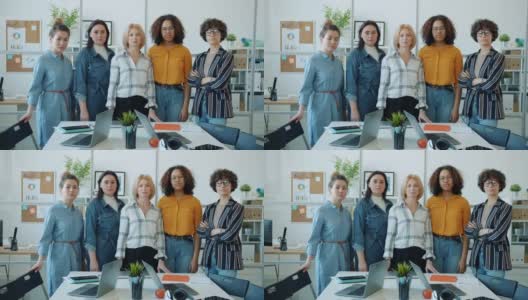 慢动作肖像的不同群体的妇女站在工作场所与严肃的脸高清在线视频素材下载