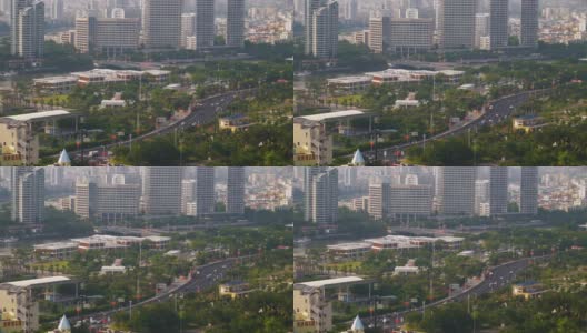 日落时间三亚酒店屋顶城市滨江交通街道全景4k海南中国高清在线视频素材下载