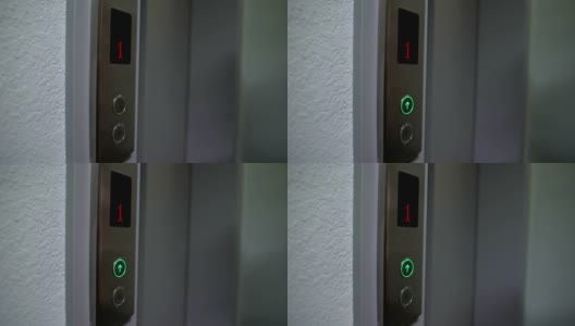 女性手指按电梯按钮，从1楼移动到楼上，特写高清在线视频素材下载