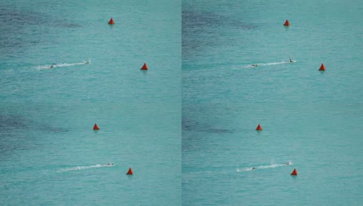 在热带，圣约翰，维尔京群岛，游泳者们向岸边游去高清在线视频素材下载