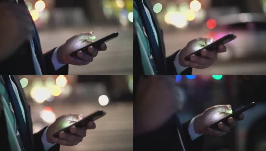 商人在晚上使用手机高清在线视频素材下载