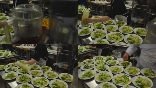 餐厅厨房厨师在凯撒沙拉上喷射沙拉酱高清在线视频素材下载