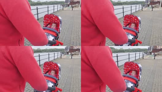 推着婴儿车的母亲高清在线视频素材下载