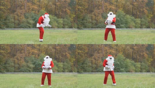 圣诞老人在草地上跳舞。背景是森林。50帧/秒高清在线视频素材下载