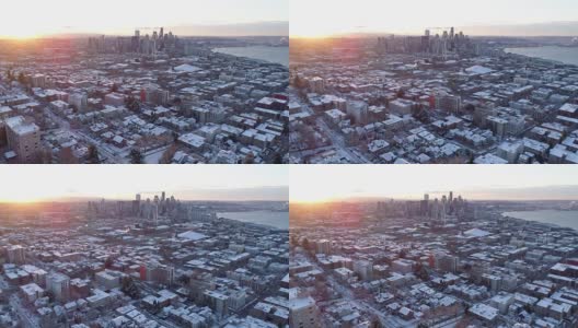 西雅图华盛顿鸟瞰图冬季雪日出光线在市中心上空飞行高清在线视频素材下载
