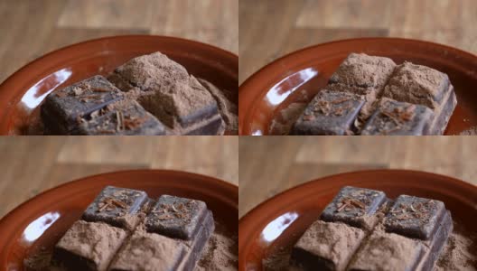 巧克力在木制背景上旋转高清在线视频素材下载