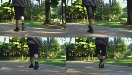 亚洲印度女性截肢与义肢行走在公园高清在线视频素材下载